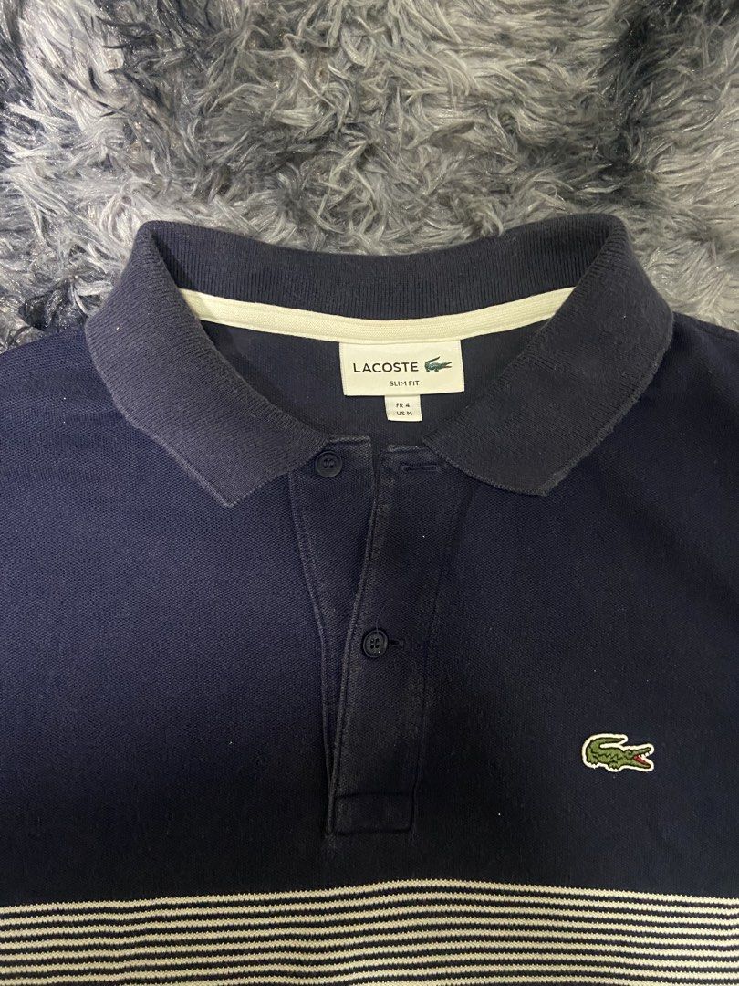 Lacoste Polo shirt (Category: Activewear) located in Tuguegarao City. Submitted by nero_28 (Listing ID 1462902964, Image 3). Description: Issue discoloration Dimes 26/19 .