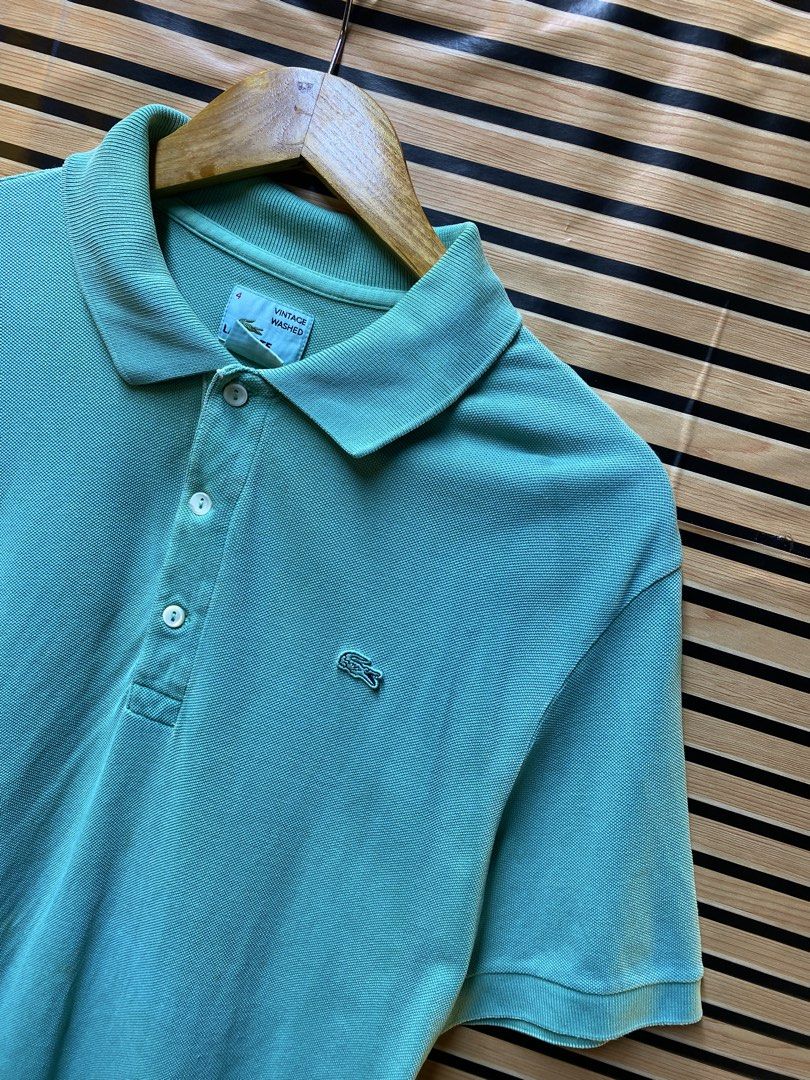 LACOSTE POLO SHIRT (Category: Tshirts & Polo Shirts ) located in Makati City. Submitted by drip.poww (Listing ID 1462939334, Image 2). Description: - Authentic Lacoste - Color: Light Green - Size: Large - Dimes: 22x28 - Authentic - Issue: yellow stain need wash - 9/10 condition - Need wash, fresh from bale - Material: 100% Cotton Please don’t expect too much—these are thrifted (ukay) items. 😊 !!STILL NEGOTIABLE!!.