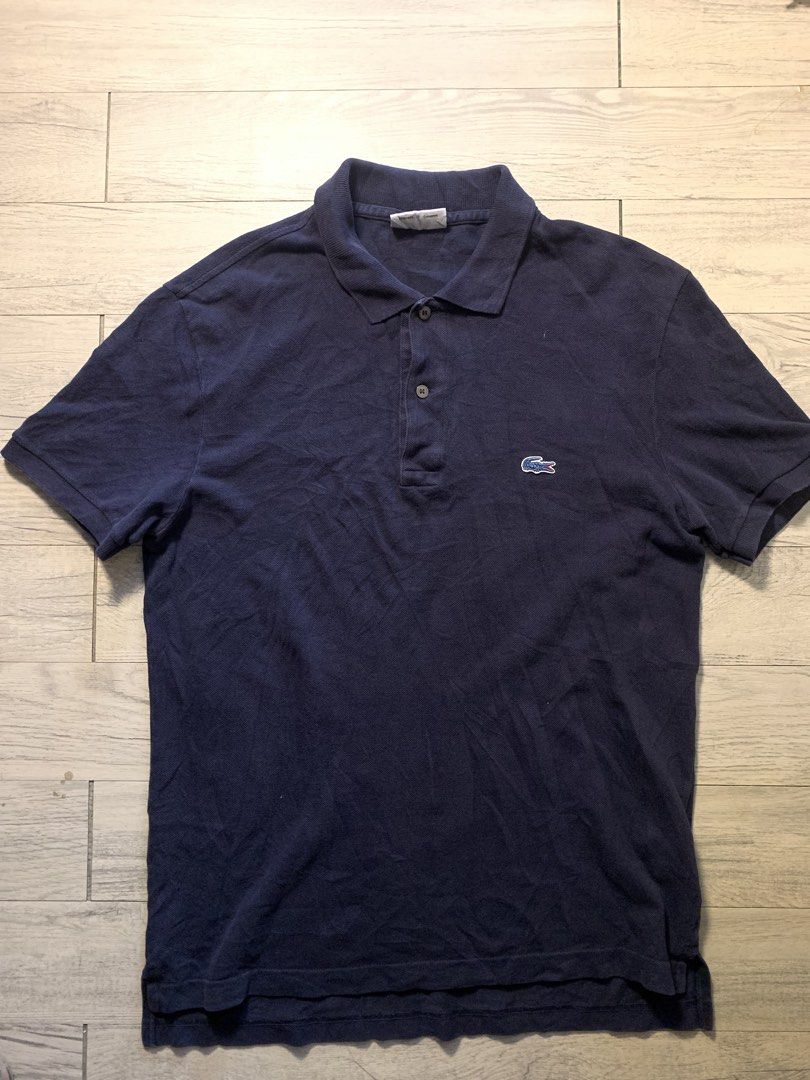 Lacoste Polo Shirt (Category: Luxury Apparel) located in Manila. Submitted by sgthriftmanila2.0 (Listing ID 1463039464, Image 1). Description: Details Size large 22x29 Excellent condition 9orup/10 CR DM .