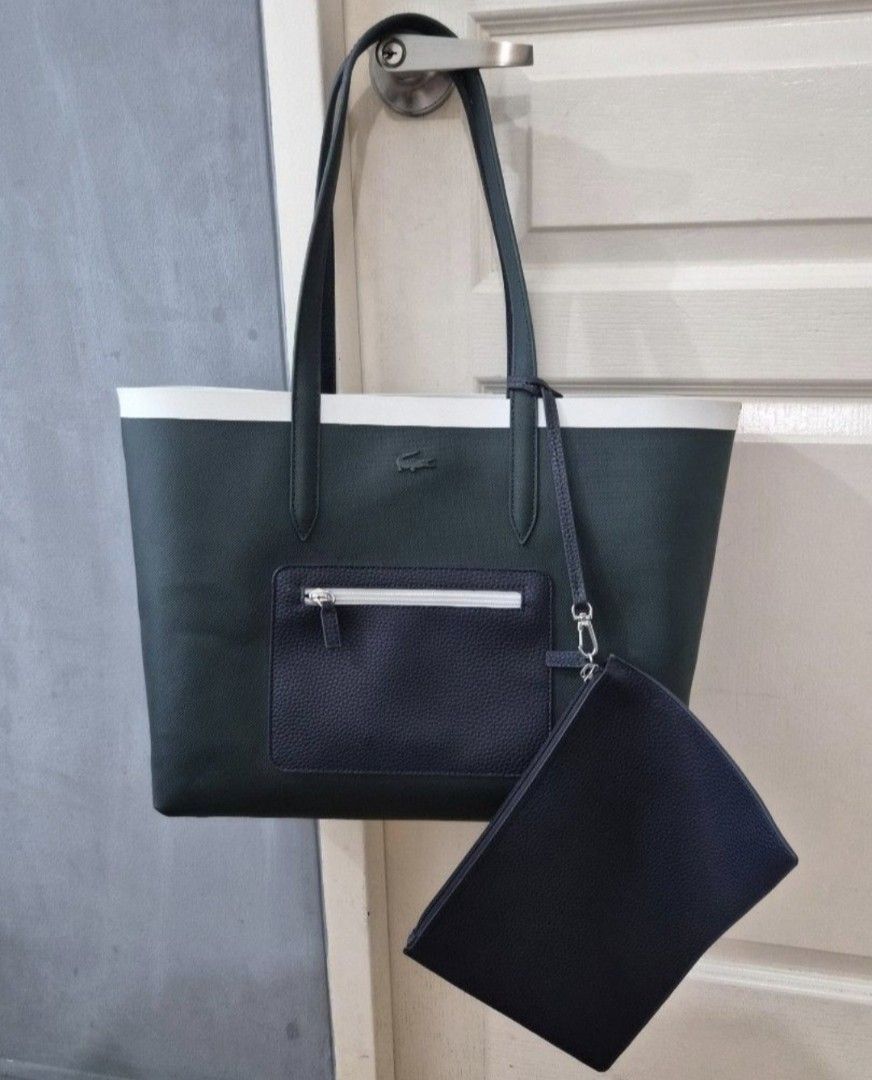 Lacoste Reversible Shopper Bag (Category: Tote Bags) located in Mandaluyong City. Submitted by Mshy09 (Listing ID 1462994125, Image 2). Description: Authentic, bought from Zalora (see last photo) Reversible tote in blue and dark green colorway. Fits a 13-15" laptop comfortably.