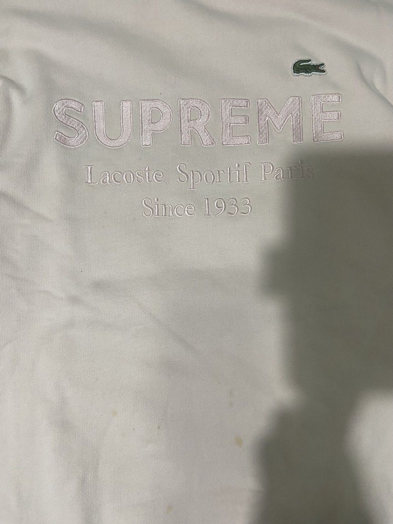 Lacoste x Supreme sweater (Category: Coats, Jackets and Outerwear) located in Tuguegarao City. Submitted by nero_28 (Listing ID 1462907232, Image 3). Description: Issue stain (see last pic) Dimes 27/20.