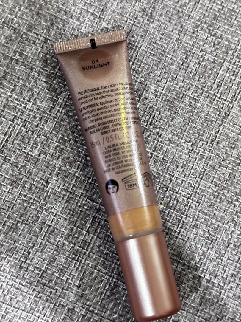 Laura Mercier Tinted Moisturizer Bronzer - Sunlight 04 (Category: Makeup) located in Manila. Submitted by rustmakeupinc (Listing ID 1463038105, Image 3). Description: - Laura Mercier Tinted Moisturizer Bronzer - Shade: 04 Sunlight - Size: 15ml tube - Creates a natural, sun-kissed glow - Easy to blend for a seamless finish - Use a small amount for desired effect.