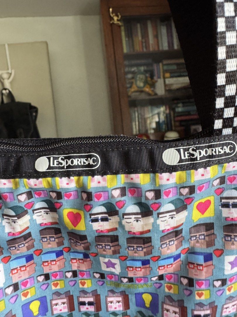 LeSportsac Tote Bag (Category: Tote Bags) located in Mabalacat. Submitted by darkmochafrappe2 (Listing ID 1462903256, Image 3). Description: - Used once the stored - Fun pixelated faces and hearts print - Black and white checkered straps - Zipper closure - Ideal for everyday use or travel - Plenty of interior space.