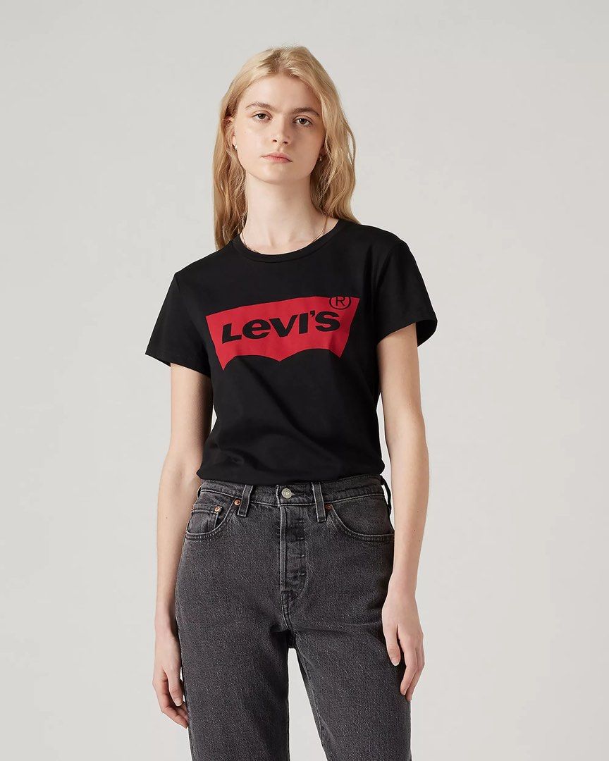 Levi's Black T-Shirt with Red Logo (Category: Tshirts & Polo Shirts ) located in Manila. Submitted by prelovedshop0818 (Listing ID 1462904417, Image 1). Description: - Classic black Levi's t-shirt - Features iconic red Batwing logo on the front - Crew neck, short sleeves - Versatile for everyday wear - Pairs well with jeans or shorts Like new! Used once only.