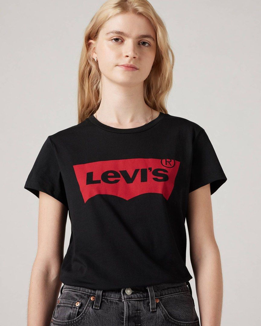 Levi's Black T-Shirt with Red Logo (Category: Tshirts & Polo Shirts ) located in Manila. Submitted by prelovedshop0818 (Listing ID 1462904417, Image 2). Description: - Classic black Levi's t-shirt - Features iconic red Batwing logo on the front - Crew neck, short sleeves - Versatile for everyday wear - Pairs well with jeans or shorts Like new! Used once only.