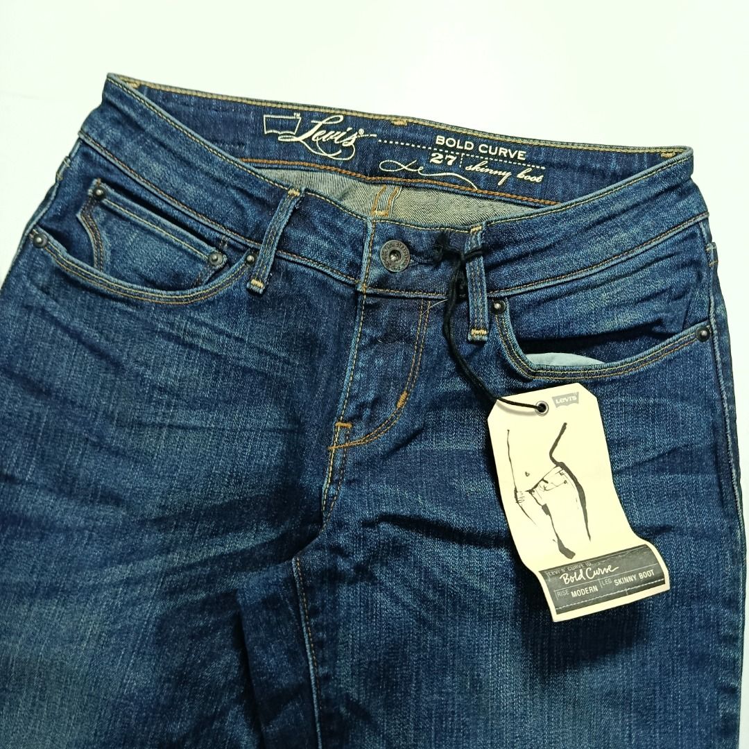 Levi’s Bold Curve Dark Indigo Bootcut (Category: Jeans) located in Taytay. Submitted by hoodgrail.vtg (Listing ID 1462950809, Image 3). Description: • Excellent condition - Like new • Original hangtag with dark indigo wash and curved-fit construction • Size on tag: W27 L32 — best fits W27–28 • Measurements: 14 x 40 in • Leg opening: 8.5 in • Color rate: 9.5/10 • Issue: None.