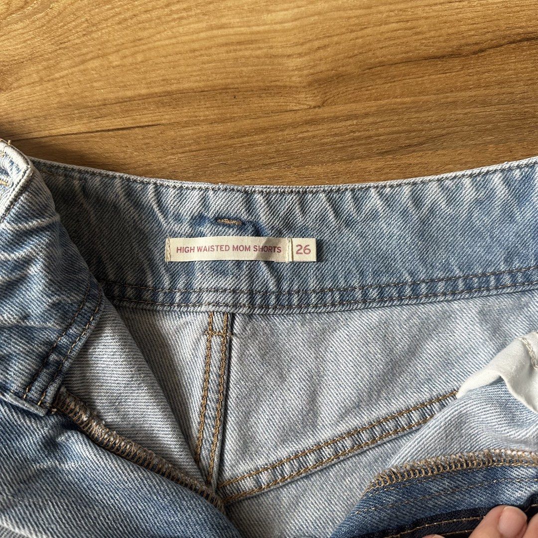 Levis High Waisted Mom Shorts (Category: Shorts) located in Pasig City. Submitted by funkypeach (Listing ID 1462898113, Image 3). Description: Authentic Levi’s High Waisted Mom Shorts. Size 26. Cute, light, denim color. In perfect condition. Used lightly. RFS Decluttering MOP Gcash Buyer shoulders shipping .