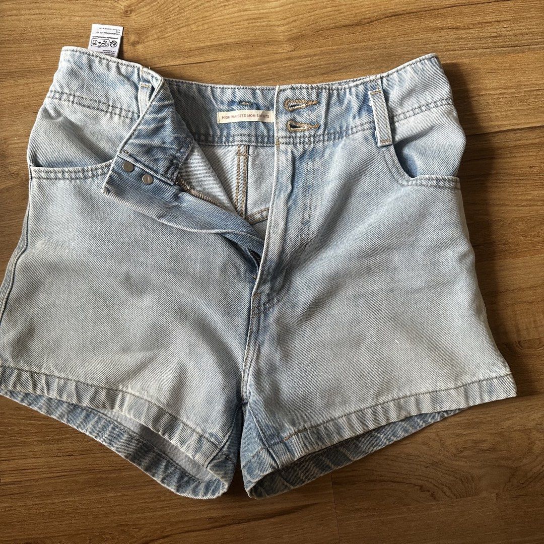 Levis High Waisted Mom Shorts (Category: Shorts) located in Pasig City. Submitted by funkypeach (Listing ID 1462898113, Image 2). Description: Authentic Levi’s High Waisted Mom Shorts. Size 26. Cute, light, denim color. In perfect condition. Used lightly. RFS Decluttering MOP Gcash Buyer shoulders shipping .