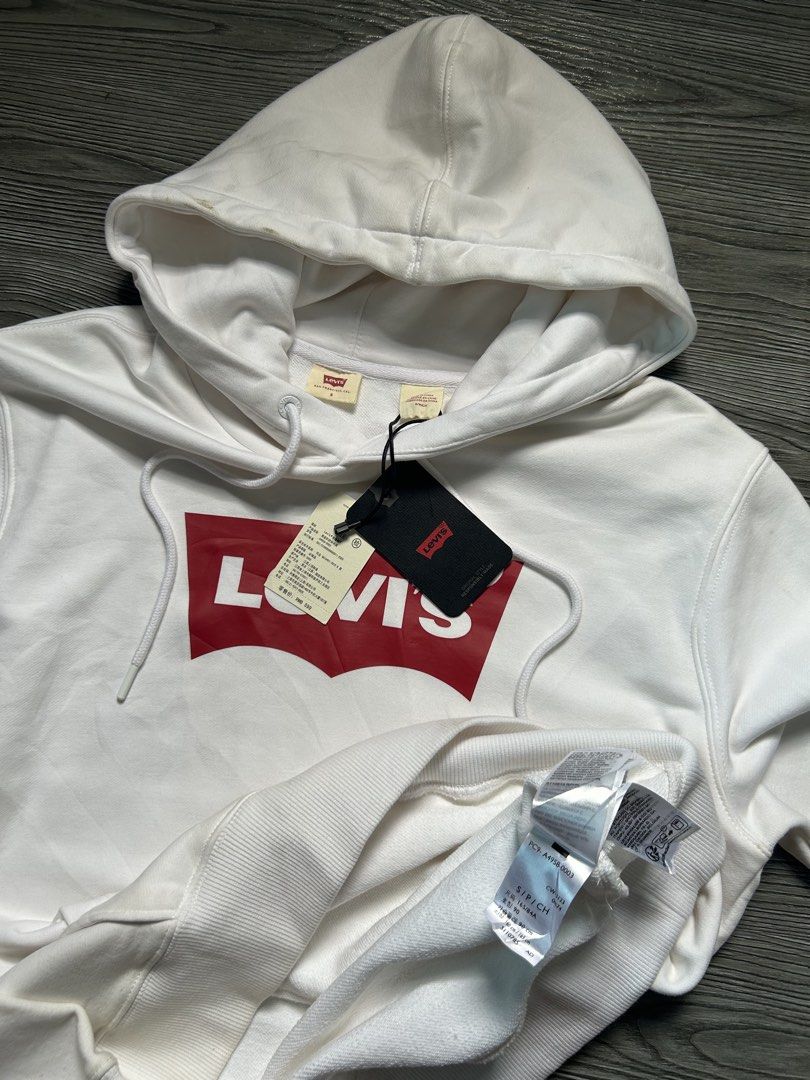 Levi's White Hoodie with Red Logo (Category: Hoodies) located in Dasmarinas. Submitted by zn_upcldtrs (Listing ID 1462996261, Image 3). Description: LEVIS DEAD-STOCK HOODIE - 22 W / 28 L - EXCELLENT CONDITION - STAINS .