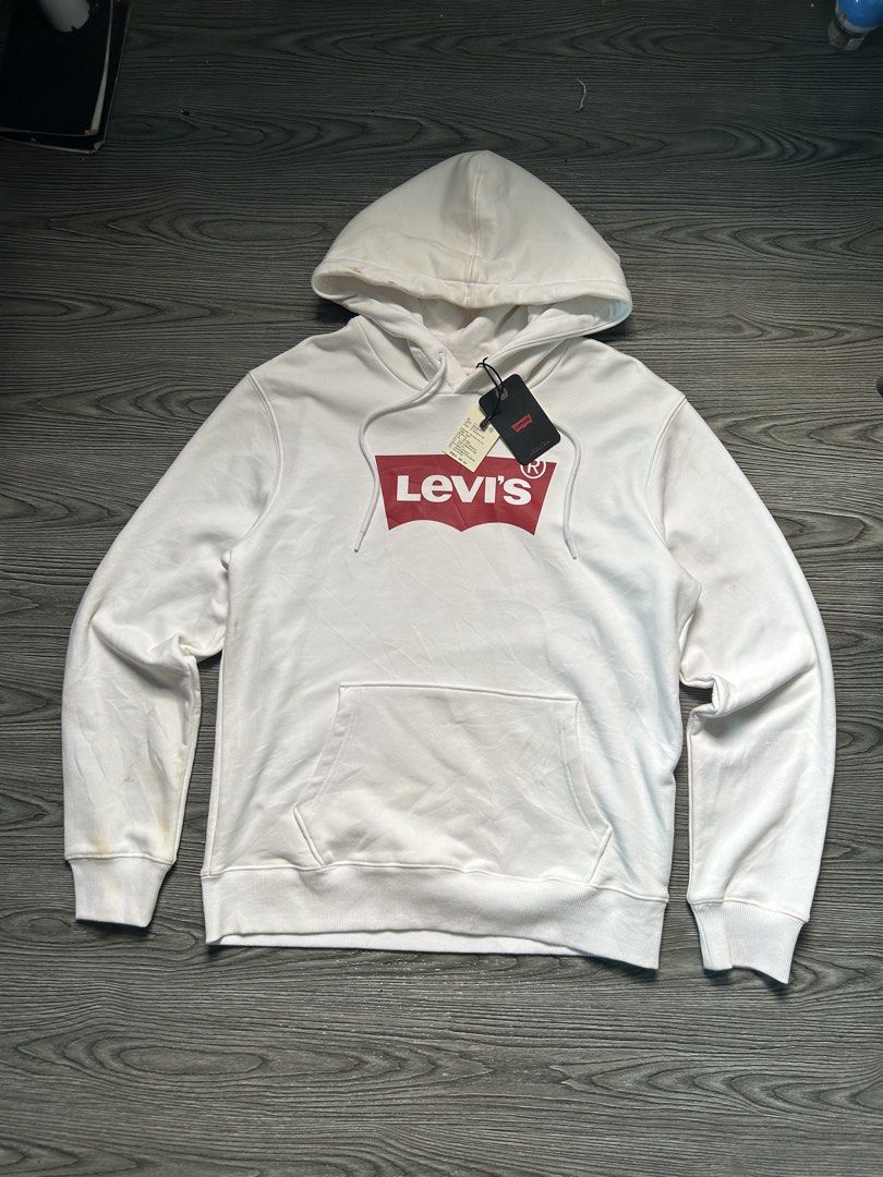 Levi's White Hoodie with Red Logo (Category: Hoodies) located in Dasmarinas. Submitted by zn_upcldtrs (Listing ID 1462996261, Image 1). Description: LEVIS DEAD-STOCK HOODIE - 22 W / 28 L - EXCELLENT CONDITION - STAINS .