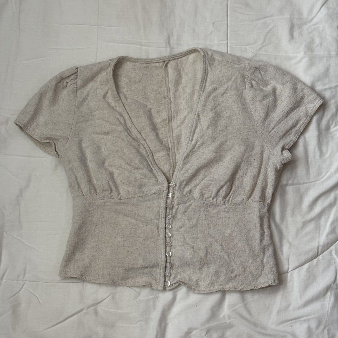 Light Beige V-Neck Button-Up Blouse (Category: Blouses) located in Iloilo. Submitted by manicfaerydream (Listing ID 1462933693, Image 1). Description: .