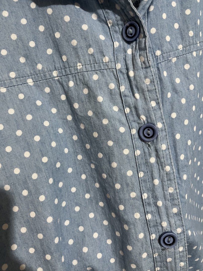 Light Blue Polka Dot Button-Up Shirt (Category: Blouses) located in Marikina City. Submitted by femmeshoppemnl (Listing ID 1462938214, Image 3). Description: Light Blue Polka Dot Button-Up Shirt Size: XL-2XL Condition: Used. With pockets on both side. Issue: Slightly faded. Brand: No brand. Ukay sourced. Washed - Ready to wear. .