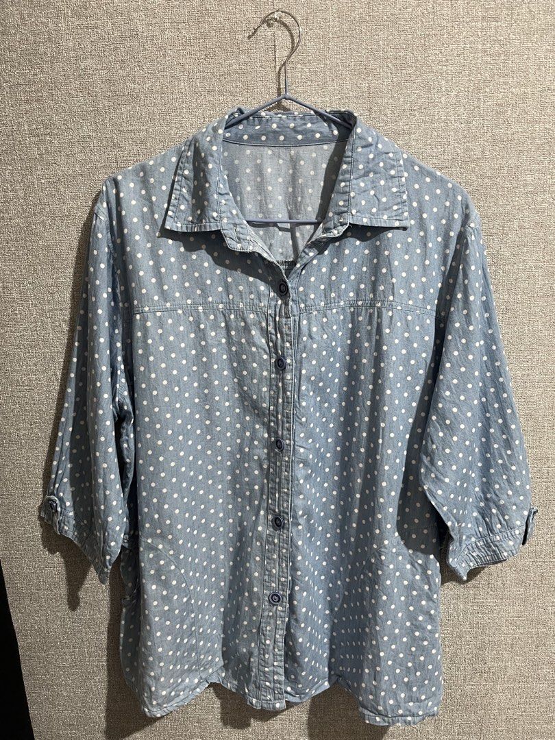 Light Blue Polka Dot Button-Up Shirt (Category: Blouses) located in Marikina City. Submitted by femmeshoppemnl (Listing ID 1462938214, Image 2). Description: Light Blue Polka Dot Button-Up Shirt Size: XL-2XL Condition: Used. With pockets on both side. Issue: Slightly faded. Brand: No brand. Ukay sourced. Washed - Ready to wear. .