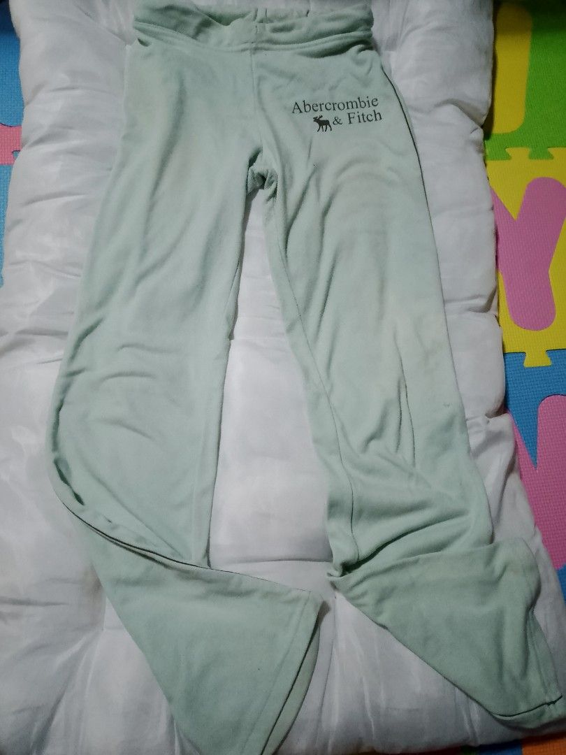 Light Green Sweatpants (Category: Other Bottoms) located in Batangas. Submitted by sheenx.09 (Listing ID 1462908609, Image 1). Description: - size 26 (waistline) - Length: 36 - Light green sweatpants from Abercrombie & Fitch 🥰 - Soft and comfortable material, perfect for lounging 😁 - Abercrombie & Fitch logo on the left hip - Elastic waistband with drawstring - Wide leg opening 😉 - Note: Some faint marks on the legs, please check photos for de