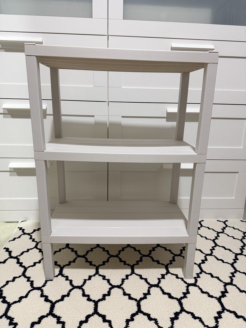 Light Grey 3-Tier Storage Shelf (Category: Shelves, Cabinets & Racks) located in Makati City. Submitted by aliced17 (Listing ID 1462996391, Image 2). Description: - Light grey 3-tier storage shelf - Made of durable plastic - Ideal for organizing any room in your home - Easy to assemble and lightweight for portability - Dimensions: Approx. 24 inches tall, 18 inches wide, 12 inches deep.