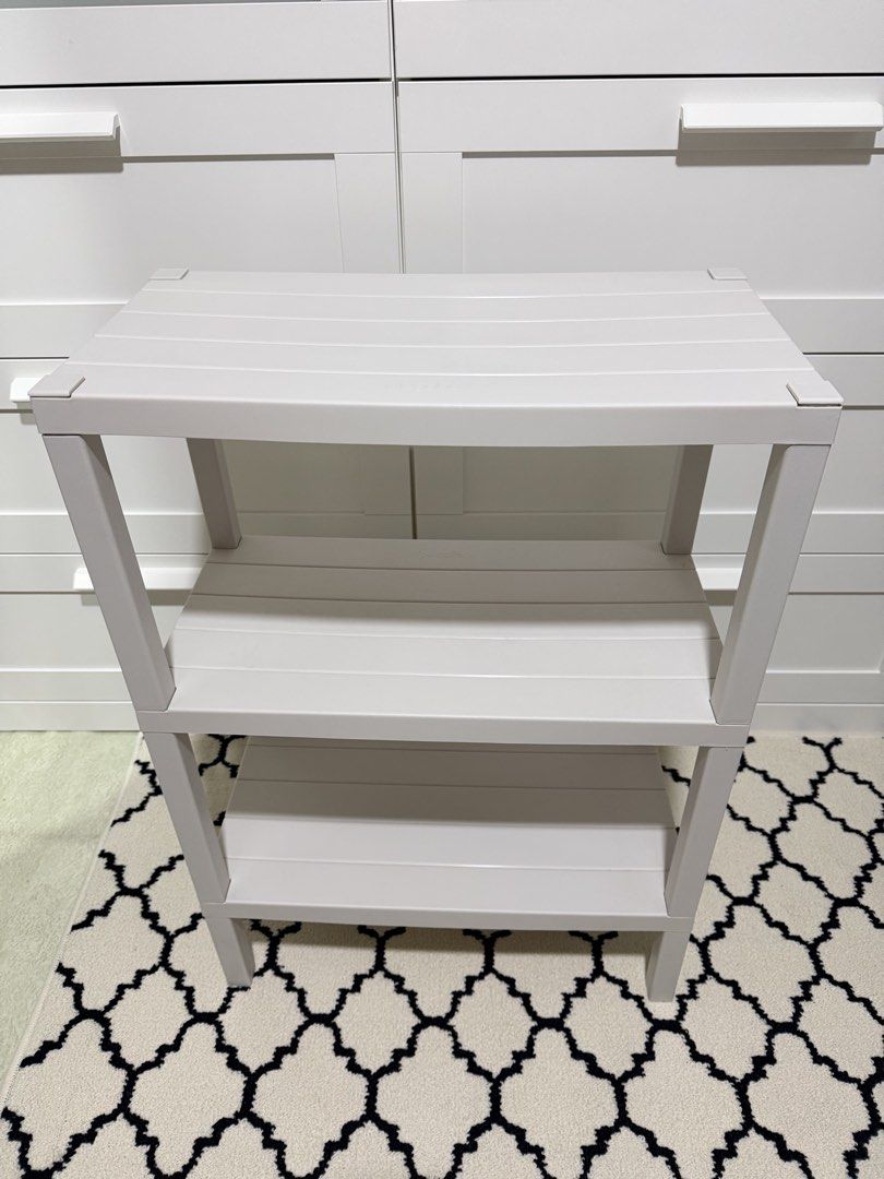 Light Grey 3-Tier Storage Shelf (Category: Shelves, Cabinets & Racks) located in Makati City. Submitted by aliced17 (Listing ID 1462996391, Image 1). Description: - Light grey 3-tier storage shelf - Made of durable plastic - Ideal for organizing any room in your home - Easy to assemble and lightweight for portability - Dimensions: Approx. 24 inches tall, 18 inches wide, 12 inches deep.