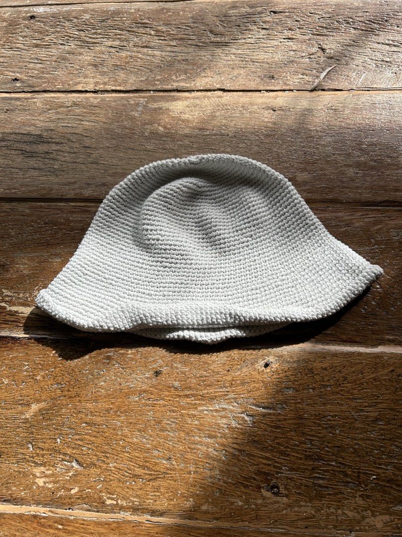 Light Grey Knit Bucket Hat (Category: Hats & Beanies) located in Surigao. Submitted by chastnavarrete (Listing ID 1463032535, Image 1). Description: - Light grey knit bucket hat - Textured material for a stylish look - Comfortable for everyday wear - Ideal for sunny days and casual outfits - Easy to pack and travel-friendly.