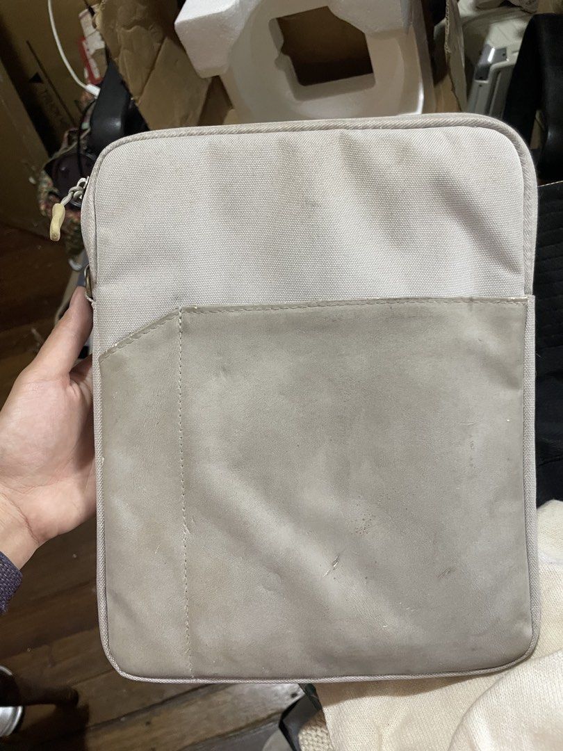 Light Grey Tablet Sleeve Pouch Ipad Sleeve Tablet Pouch (Category: Purses & Pouches) located in Quezon City. Submitted by garagesaleonline (Listing ID 1462891809, Image 1). Description: - Light grey color - Padded interior for extra protection - Secure zipper closure - Fits most standard tablets - Ideal for travel and daily use.