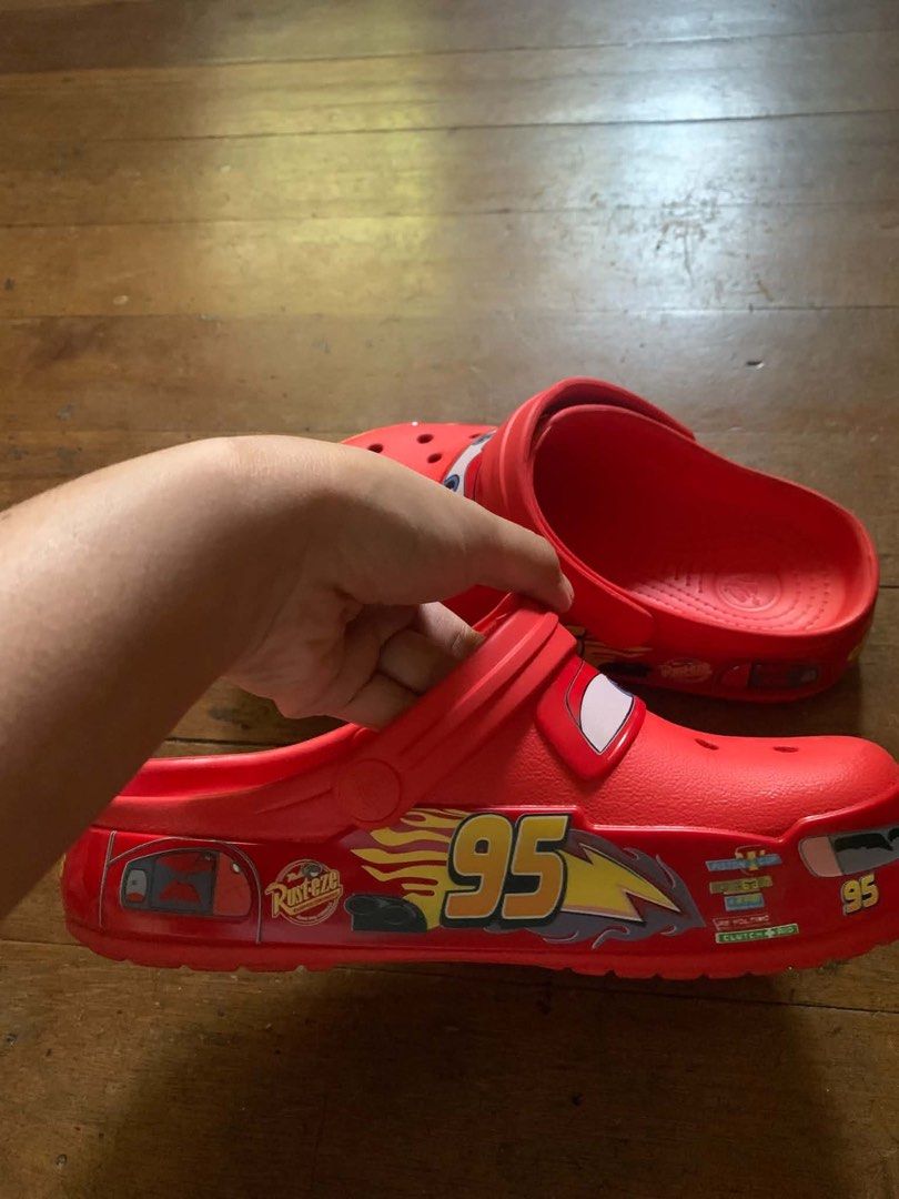 Lightning McQueen Crocs Size 7 (Category: Babies & Kids Fashion) located in Quezon City. Submitted by sooomiz (Listing ID 1462886765, Image 2). Description: ♡ Red Crocs featuring Lightning McQueen from Cars ♡ Size 7 ♡ Ideal for Cars fans ♡ Easy slip-on/slip-off design ♡ Great for playtime and casual wear ♡ Selling for a friend ! ♡ Used once.