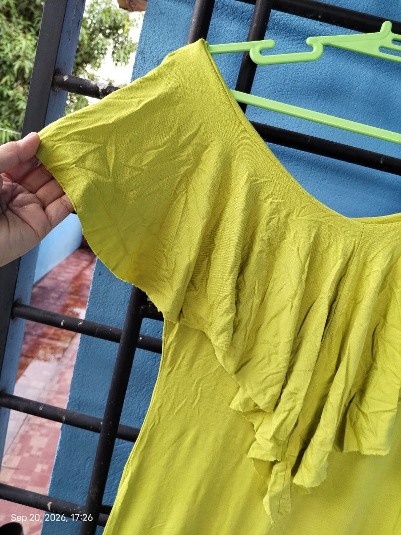 Lime Green Ruffled Off-Shoulder Maxi Dress (Category: Dresses) located in Mabalacat. Submitted by whowannashoppe (Listing ID 1463008508, Image 2). Description: - Flowy lime green maxi dress - Ruffled off-shoulder neckline - Short flutter sleeves - Comfortable and casual - Ideal for beach days or relaxed outings - Easy to wear and style - Cut tag - Size 38 on tag but fits up to large body frame - Stretchy fabric.