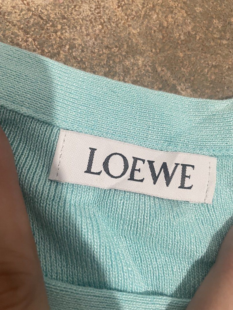 Loewe knit crop top (Category: Others Tops) located in Davao. Submitted by mj_designervintagecurator (Listing ID 1463056262, Image 2). Description: 📌In good condition 📌removed wash tag 📌best fit small to semi med 📌shoulder 10.5- bust 30-36- length 15.5 inches/ armhole 17.