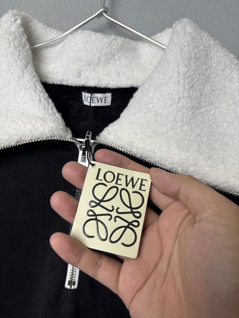 Loewe Quarterzip Crewneck Sweater (Category: Coats, Jackets and Outerwear) located in Mandaluyong City. Submitted by fellas_ph (Listing ID 1463035532, Image 2). Description: Excellent condition No issues Size L-XL Boxy 23" Width 27" Length.
