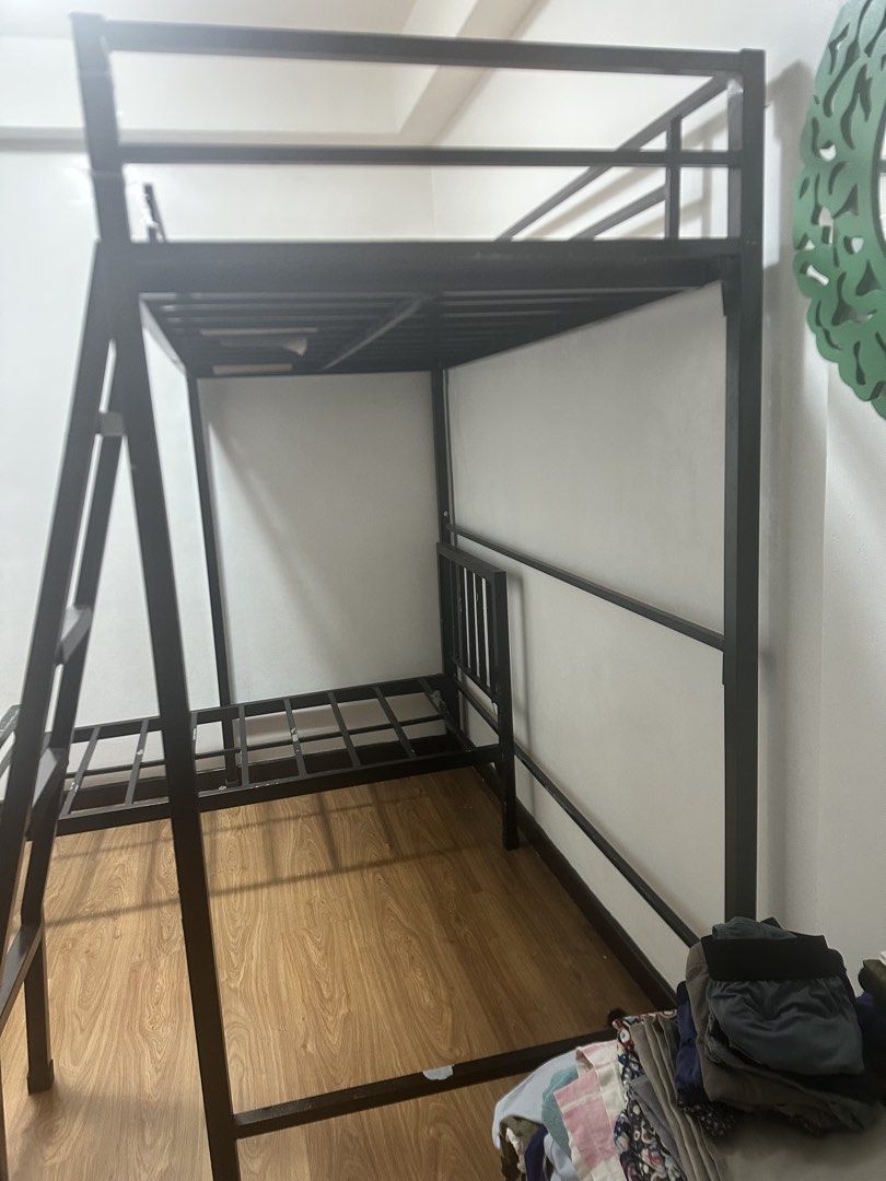 Loft bed for sale (Category: Bed Frames & Mattresses) located in Manila. Submitted by pixietink08 (Listing ID 1462987537, Image 1). Description: - Loft bed for sale - Single size - Durable black metal frame - Modern and functional design - Maximizes floor space.