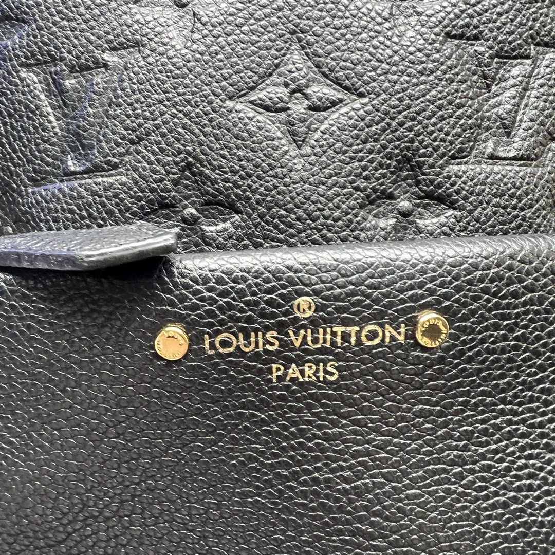 authentic Louis Vuitton sorbonne Black empreinte leather hardware Monogram Backpack (Category: Luxury Bags & Wallets) located in Quezon City. Submitted by chekho22 (Listing ID 1463019567, Image 3). Description: - used just a few times comes with stuffing pillow Authentic Louis Vuitton backpack - Color: Black - Material: Textured leather with embossed monogram pattern - Hardware: Gold-tone details - Features: Front zip pocket, adjustable straps - 