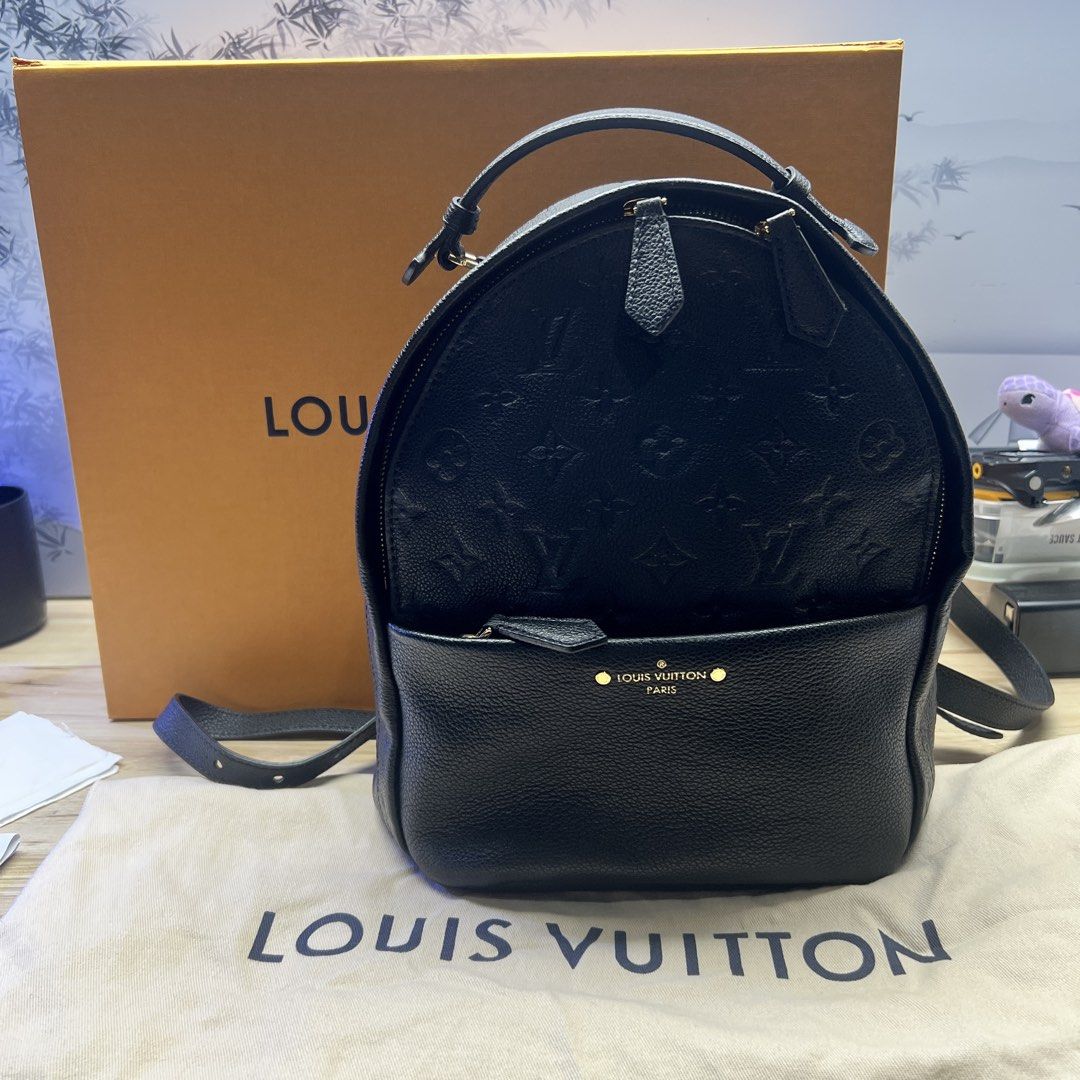authentic Louis Vuitton sorbonne Black empreinte leather hardware Monogram Backpack (Category: Luxury Bags & Wallets) located in Quezon City. Submitted by chekho22 (Listing ID 1463019567, Image 1). Description: - used just a few times comes with stuffing pillow Authentic Louis Vuitton backpack - Color: Black - Material: Textured leather with embossed monogram pattern - Hardware: Gold-tone details - Features: Front zip pocket, adjustable straps - 