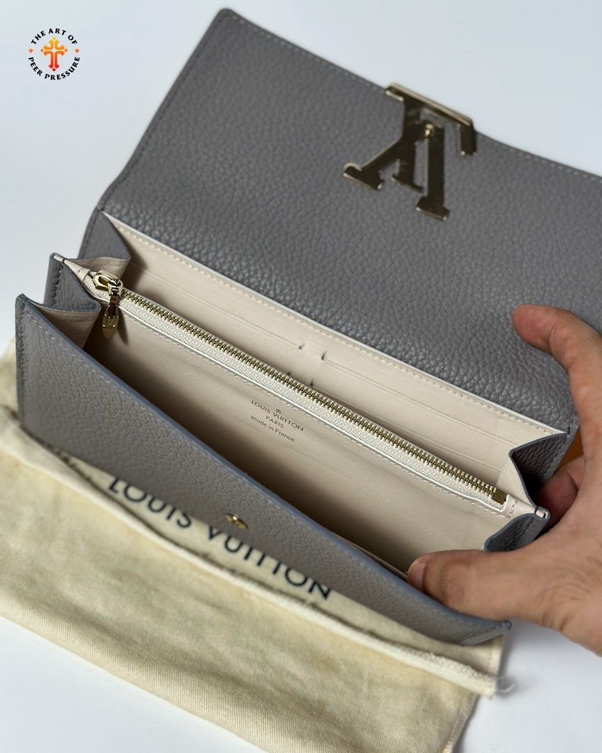 Louis Vuitton Capucines Wallet (Category: Luxury Bags & Wallets) located in Calamba. Submitted by theartofpeerpressurelgn (Listing ID 1463053200, Image 3). Description: LV Capucines Wallet Like new, complete with COA. Retails for ₱87,500 in stores. Selling for ₱34,900 only. 💳 Layaway available 💯 Guaranteed Authentic 📍 Calamba City, Laguna 🚚 Lalamove / LBC DM us to purchase. FB: The Art of Peer Pressure IG: @theartofpeerpressurelgn.