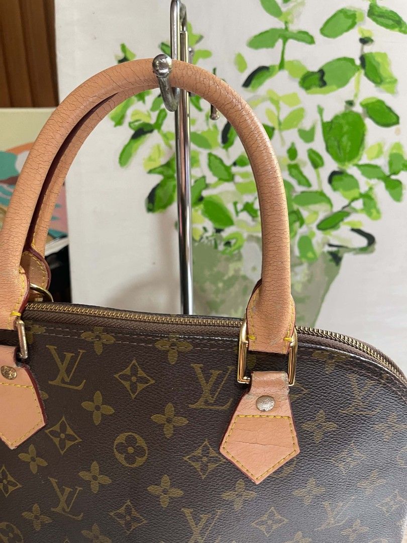 Louis Vuitton Monogram Alma Handbag (Category: Tote Bags) located in Naawan. Submitted by twilly.apparel2 (Listing ID 1462909813, Image 2). Description: - issue handle mag mga crack, may rust ang some of the hardware Classic Louis Vuitton Alma bag in monogram canvas. - Leather handles show typical signs of wear and cracking. - Zipper functions smoothly. - A timeless and iconic piece for your collection. - Ready for its next owner..