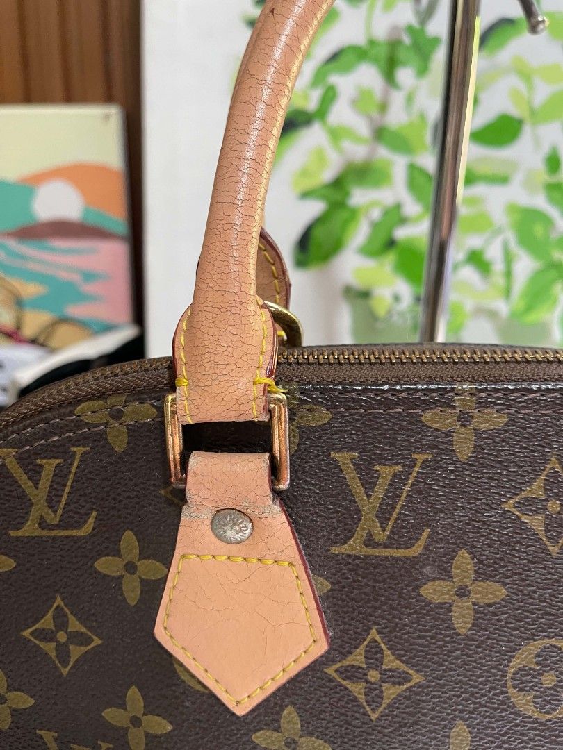 Louis Vuitton Monogram Alma Handbag (Category: Tote Bags) located in Naawan. Submitted by twilly.apparel2 (Listing ID 1462909813, Image 3). Description: - issue handle mag mga crack, may rust ang some of the hardware Classic Louis Vuitton Alma bag in monogram canvas. - Leather handles show typical signs of wear and cracking. - Zipper functions smoothly. - A timeless and iconic piece for your collection. - Ready for its next owner..