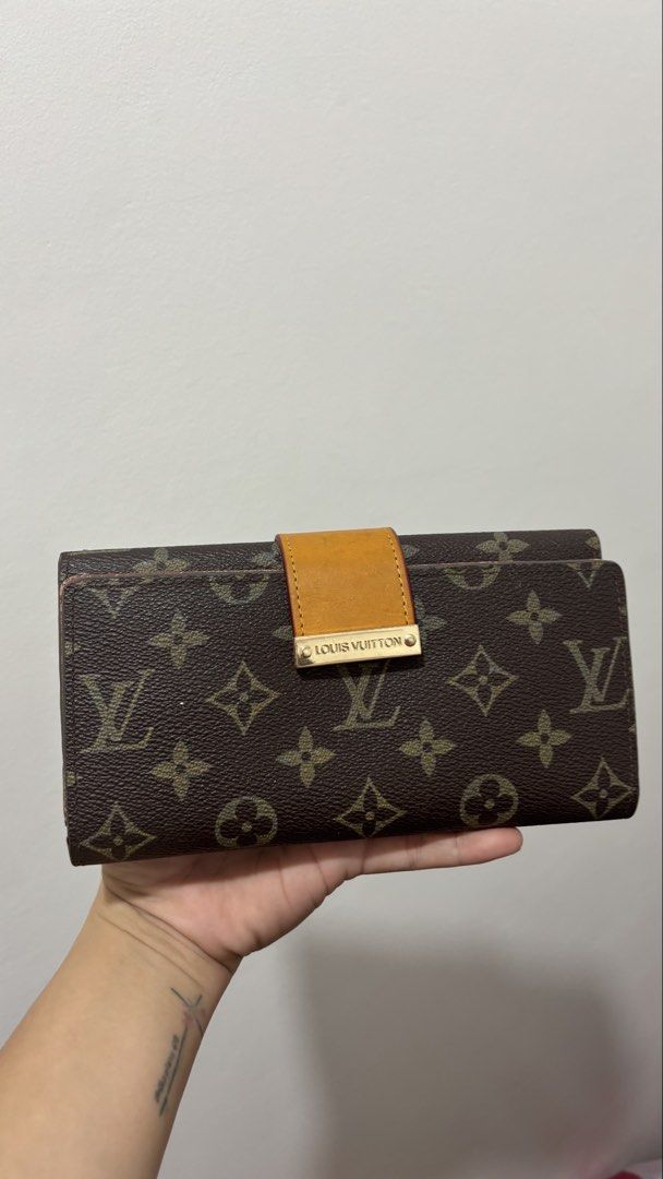 Louis Vuitton Monogram Long Wallet (Category: Luxury Bags & Wallets) located in Manila. Submitted by robbyrabbit (Listing ID 1462916737, Image 1). Description: - Authentic Louis Vuitton Monogram Wallet - Ample card slots for organization - Secure zippered compartment for coins/small items - Shows some signs of interior wear, as pictured - Plenty of life remaining, great value - Sold as is.