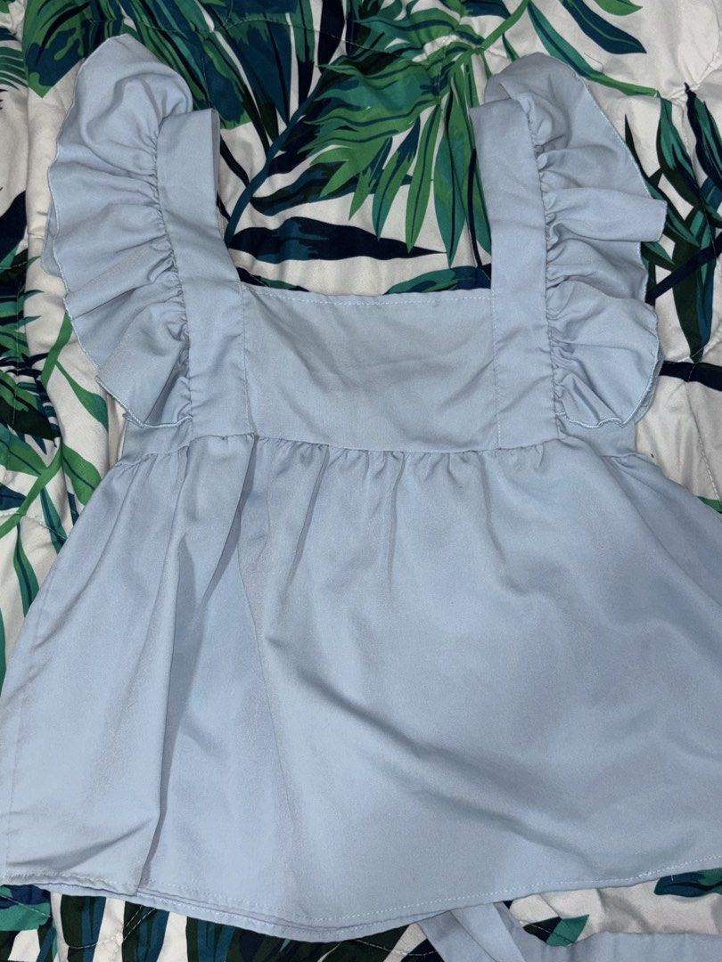 Lovito Casual Plain Bow Back Top (Category: Blouses) located in Manila. Submitted by beelvrd (Listing ID 1462999797, Image 1). Description: - Cute light blue top - Ruffle sleeves - Tie-front detail at the back - Square neckline - Free size, big on the sleeves for me.