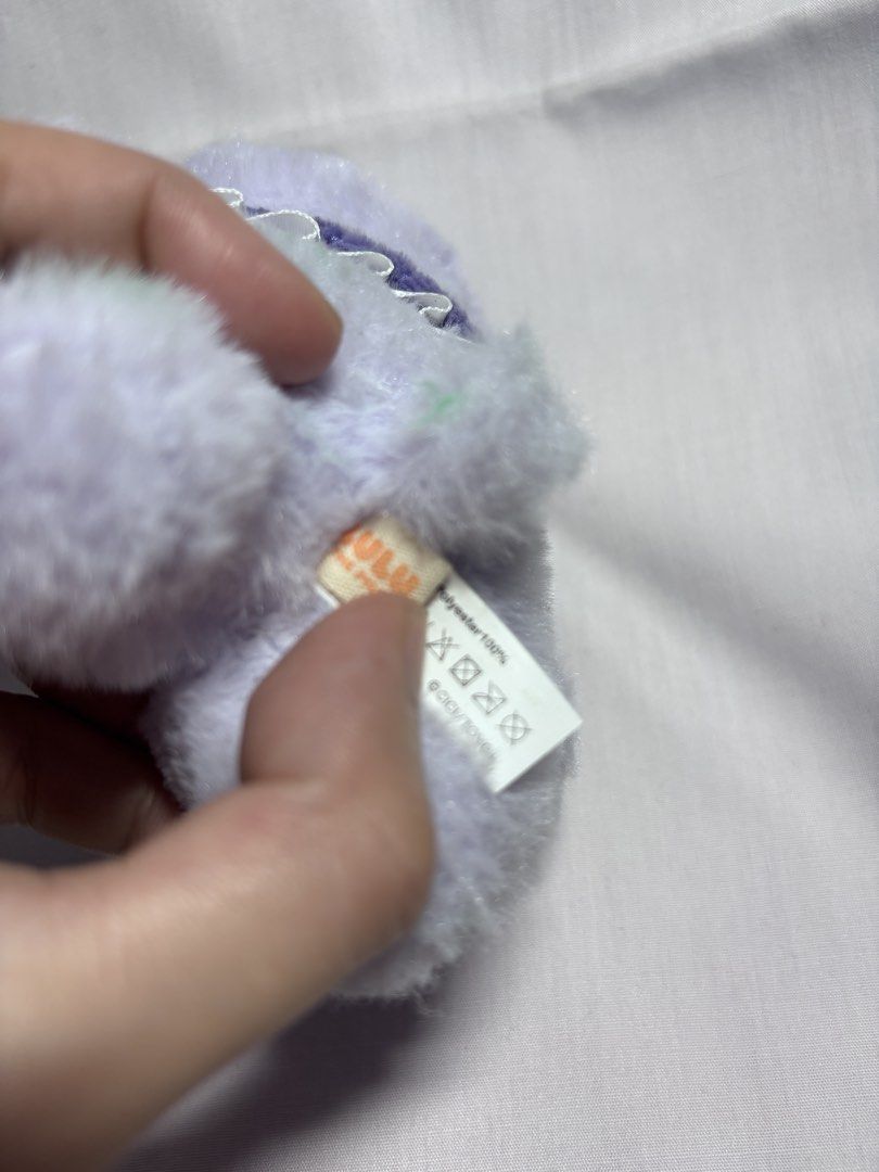 Lulu Purple Pig Plush Charm (Category: Plushies & Soft Toys) located in Sablan. Submitted by 21enygrace.ph (Listing ID 1462949997, Image 3). Description: - Adorable plush pig keychain - Features a cute purple hooded outfit - Decorated with a sweet bow and fluffy pom-poms - Made from soft and fluffy material - Ideal for personalizing bags, backpacks, or keys - A must-have accessory for lovers of all things cute!.