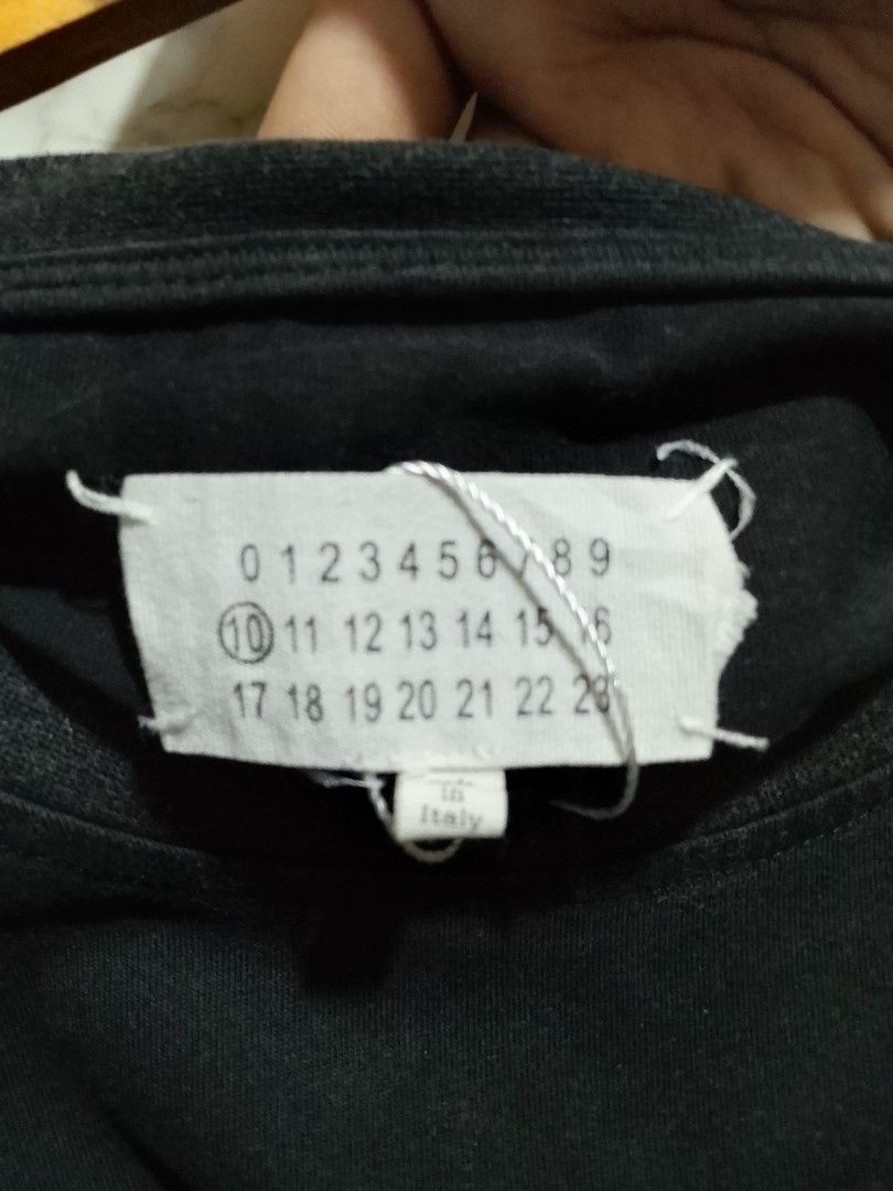 Maison Margiela Rectangle Tshirt (Category: Tshirts & Polo Shirts ) located in Paranaque City. Submitted by lanceee.999 (Listing ID 1462932788, Image 3). Description: Size: L Dimes: W27 L29.5 Color Rate: 7/10 Complete Tags Off/Authentic No Issue Good Condition.
