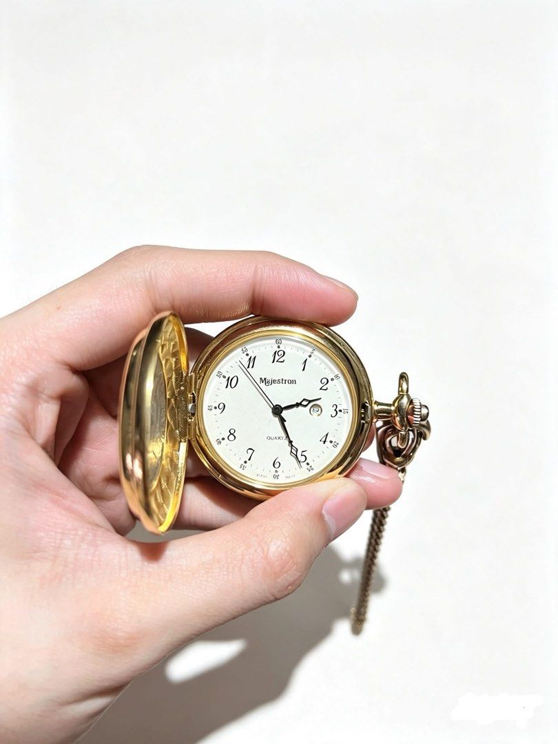 Majestron Quartz Pocket Watch with Chain (Category: Men's Watches) located in Manila. Submitted by joshuahonggg (Listing ID 1462947623, Image 1). Description: Majestron Quartz Full Hunter Pocket Watch With date window & chain gold-tone plated (Modern Quartz) Made of gold-plated base metal, not solid gold — value stays modest Clean, working well, complete with chain Issue: No box Only ₱2,500 Original Retail Price: ₱4,500.