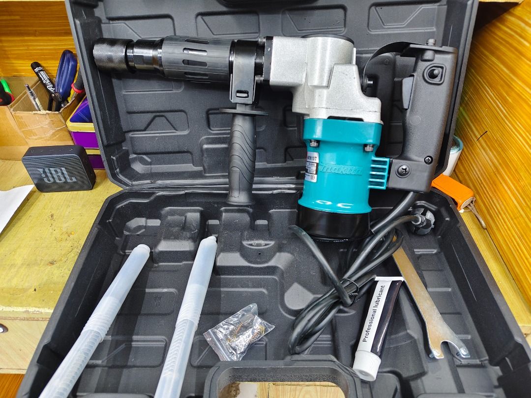 Makita Rotary Hammer Drill (Category: Construction Tools & Equipment) located in Caloocan City. Submitted by margaritom16124 (Listing ID 1463055183, Image 1). Description: - Makita Rotary Hammer Drill - Color: Teal and Black - Includes: Handle and Power Cord - Condition: Works Great - Ready for your next project!.