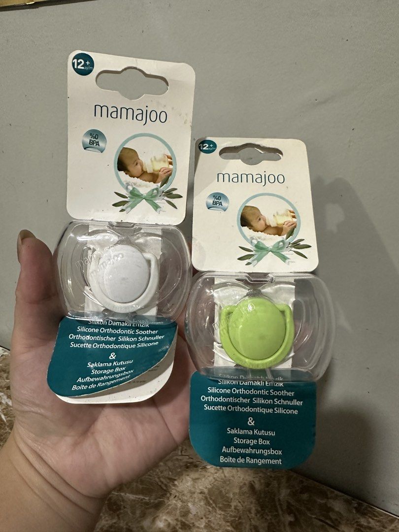 Mamajoo Silicone Orthodontic Soother (Category: Soothers & Pacifiers) located in Baguio. Submitted by azbentabols (Listing ID 1462935697, Image 1). Description: Mamajoo Silicone Orthodontic Soother Sealed(madumi lang paper since natambak) Get 2 for ₱250.
