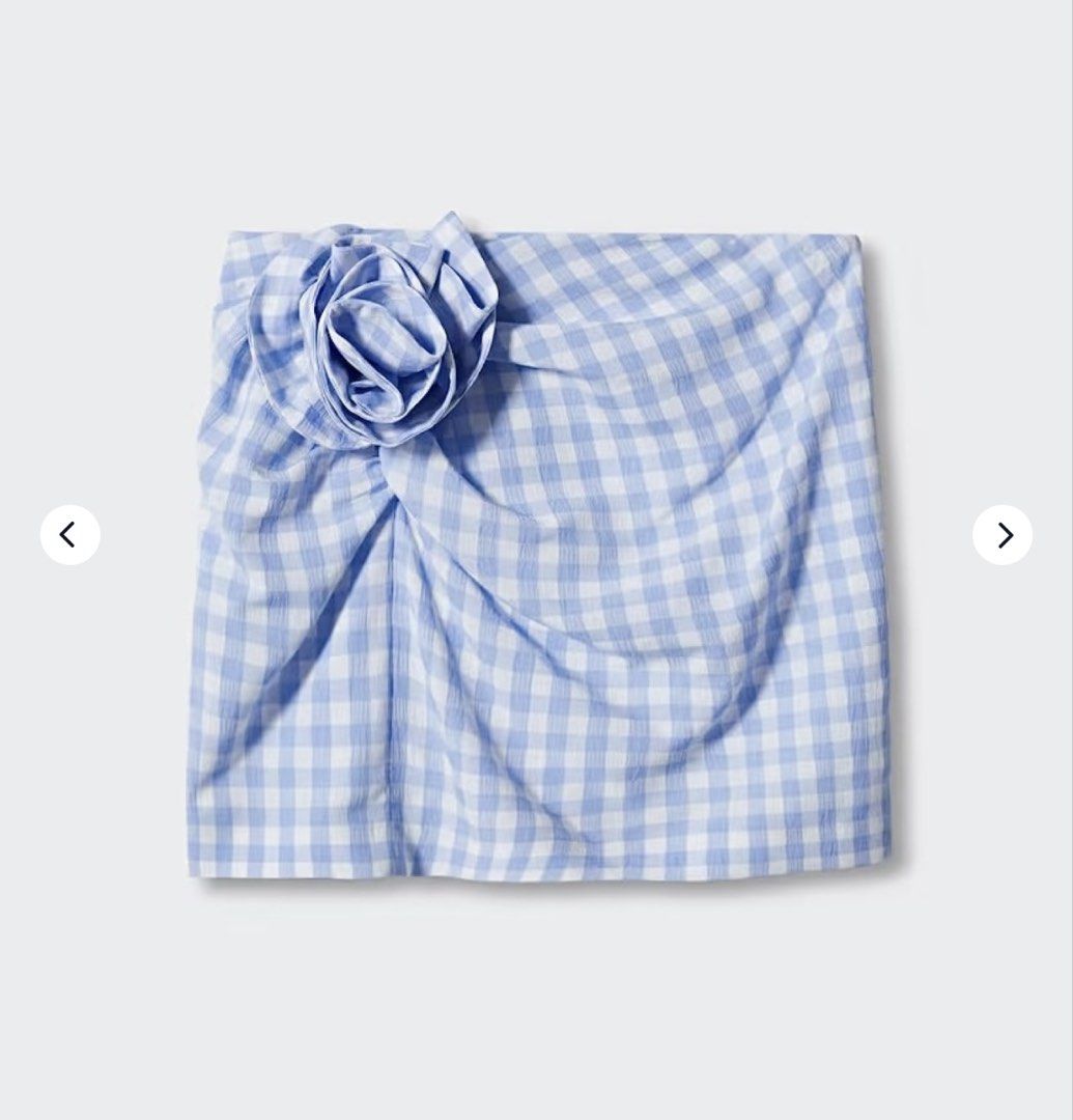 Mango Blue Gingham Rose Mini Skirt (Category: Skirts) located in Cagayan de Oro. Submitted by jeirn (Listing ID 1462970925, Image 2). Description: - Cute blue gingham mini skirt - Features a large rose detail at the waist - Ruched detailing for added texture - Ideal for summer outfits - Can be paired with the matching blazer or a simple top - Brand: Mango.