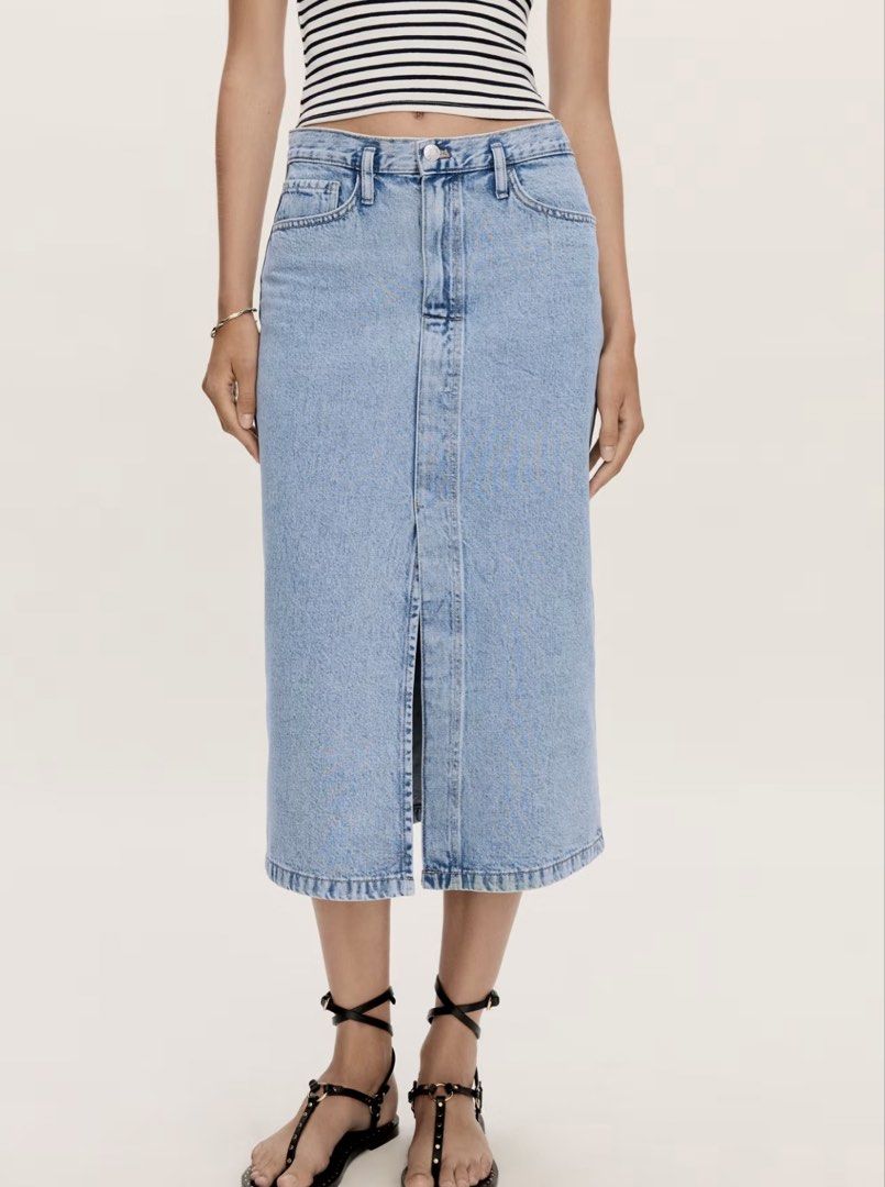 MANGO Light blue Denim Midi Skirt with Front Slit medium (Category: Skirts) located in Cagayan de Oro. Submitted by jeirn (Listing ID 1463114443, Image 2). Description: - Classic light wash denim midi skirt - Features a front slit for easy movement - Two back pockets - Belt loops for styling options - Versatile for casual outings and everyday wear.