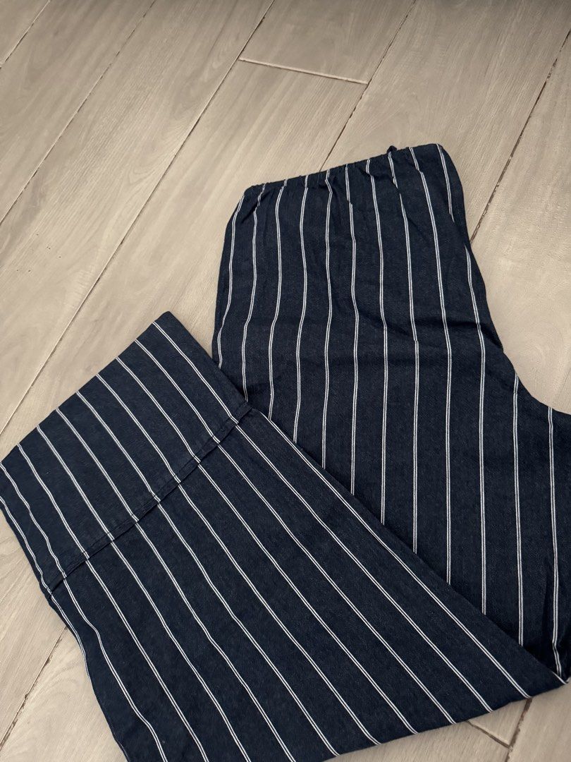Mango Navy Striped Wide Leg Pants with Drawstring Waist (Category: Other Bottoms) located in Taguig. Submitted by sqaumejada (Listing ID 1462894404, Image 2). Description: - Navy blue pants with white vertical stripes - Wide leg cut for a relaxed fit - Comfortable elastic waistband with adjustable drawstring tie - Cuffed hem detail - Ideal for casual, everyday styling fits l-xxl.