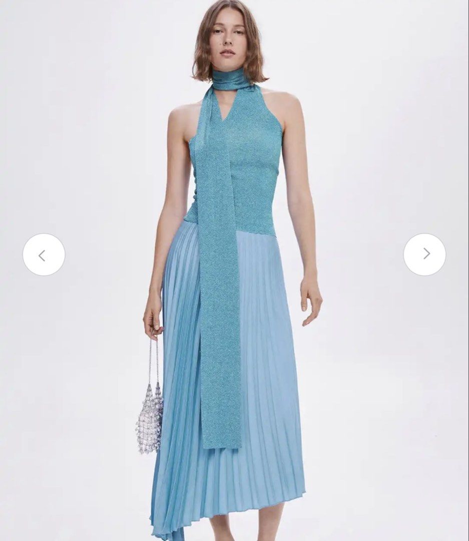 Mango Pleated Midi Skirt XL Blue (Category: Skirts) located in Cagayan de Oro. Submitted by jeirn (Listing ID 1463001964, Image 3). Description: - Mango blue pleated midi skirt - Asymmetrical hemline - Size XL - Perfect for dressing up or down - Great for parties or a casual day out.