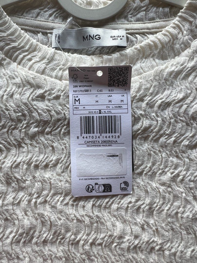 MANGO Textured Mock Neck Long Sleeve Top M (Category: Longsleeves) located in Cagayan de Oro. Submitted by jeirn (Listing ID 1463117847, Image 3). Description: - Brand: MANGO - Style: Long sleeve top - Color: Cream - Neckline: Mock neck - Fabric: Unique crinkle texture all over - Size: Medium (M) - Condition: Brand new, never worn - Versatile: Great on its own or for layering.