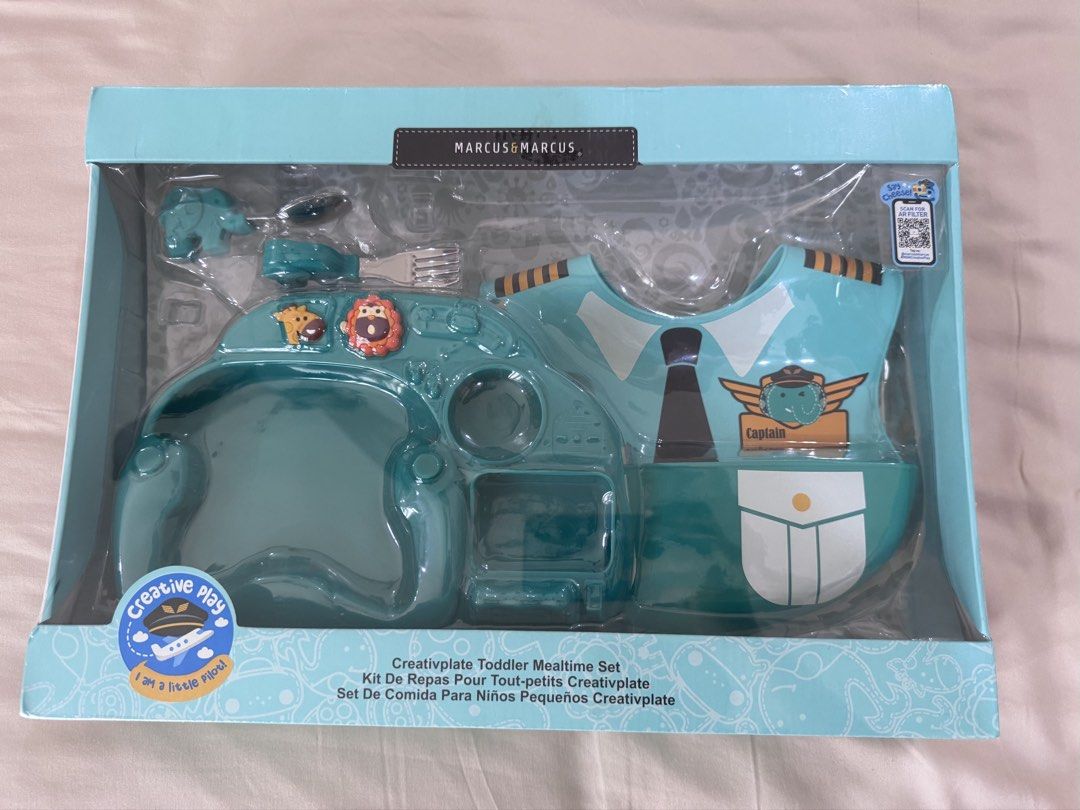 Marcus & Marcus Creativplate Toddler Mealtime Set (Category: Weaning & Toddler Feeding) located in Paranaque City. Submitted by nicalmeda (Listing ID 1462898823, Image 2). Description: - Marcus & Marcus Creativplate Toddler Mealtime Set - Fun pilot theme to engage toddlers - Set includes plate and silicone bib - Designed to make mealtime enjoyable and easier - Easy to clean and use - Ideal for toddlers learning self-feeding Sealed and unopened.