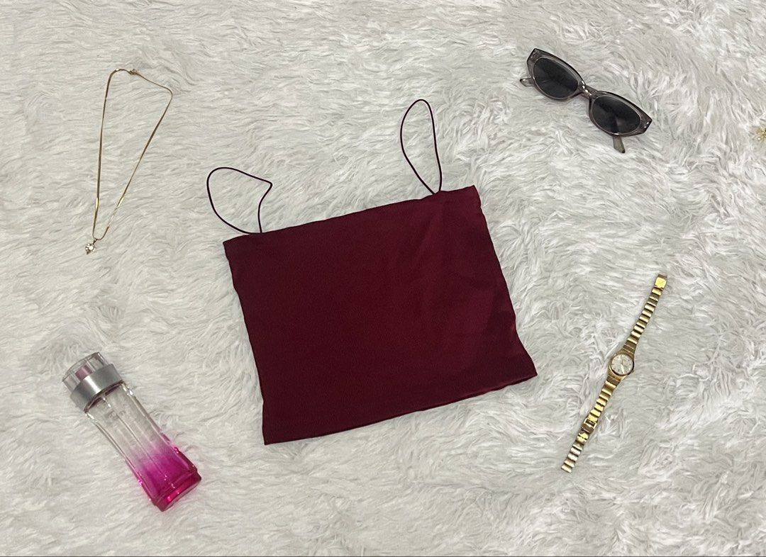 Maroon Spaghetti Strap Crop Top (Category: Sleeveless) located in Tuguegarao City. Submitted by love_clothies (Listing ID 1462903404, Image 1). Description: - Cute maroon spaghetti strap crop top - Stretchy material for a comfy fit - Versatile: pairs perfectly with jeans or skirts - Ideal for casual days or nights out with friends - Easy to style and wear.