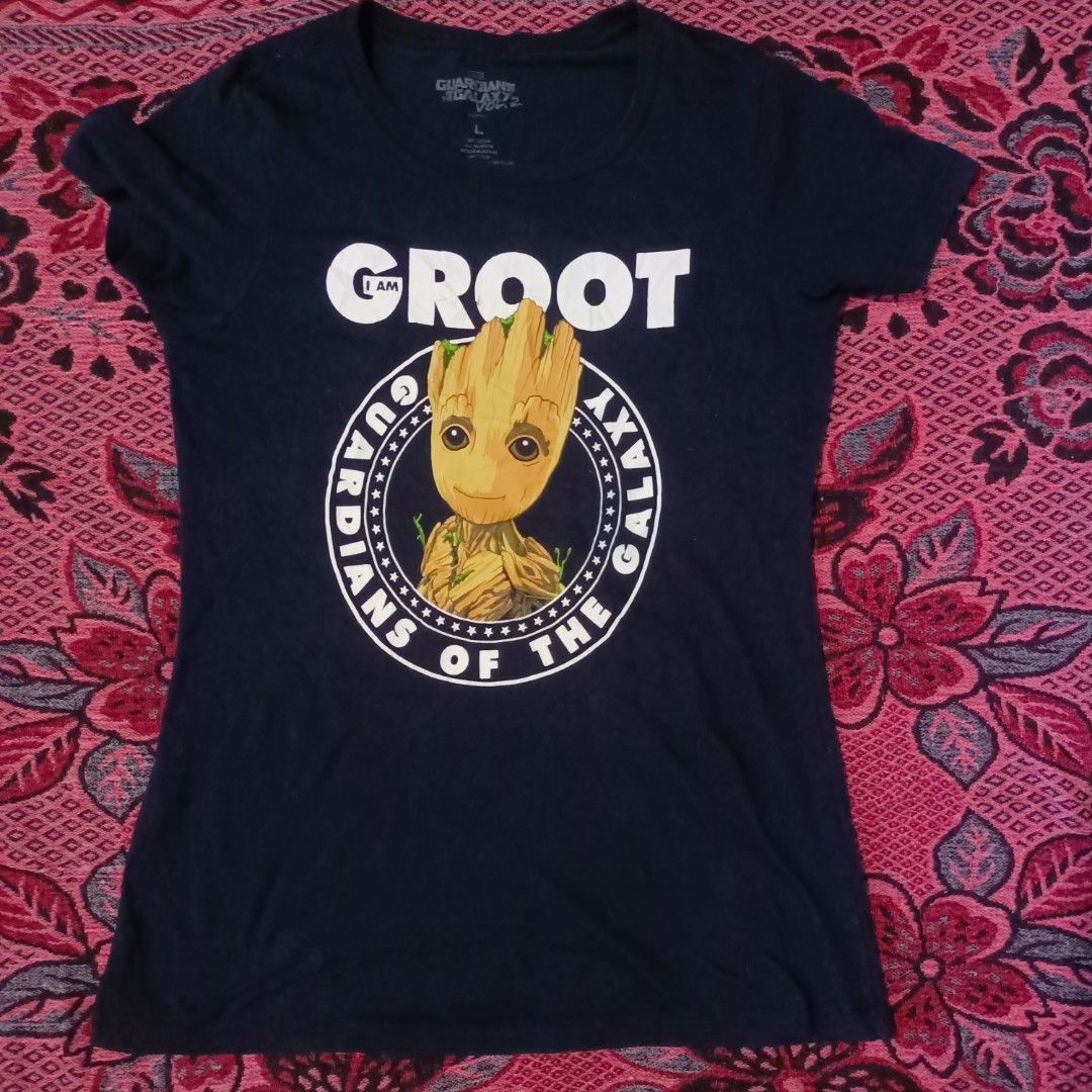Marvel (I am Groot) (Category: Activewear) located in Cavite. Submitted by kjthriftlabcorner (Listing ID 1462907073, Image 3). Description: - Official Licensed: Marvel — Guardians of the Galaxy Vol. 2 ​ - Design: "I AM GROOT" featuring Baby Groot ​ - Size: L ​ - Color: Navy Blue ​ - Material: 60% cotton / 40% polyester.