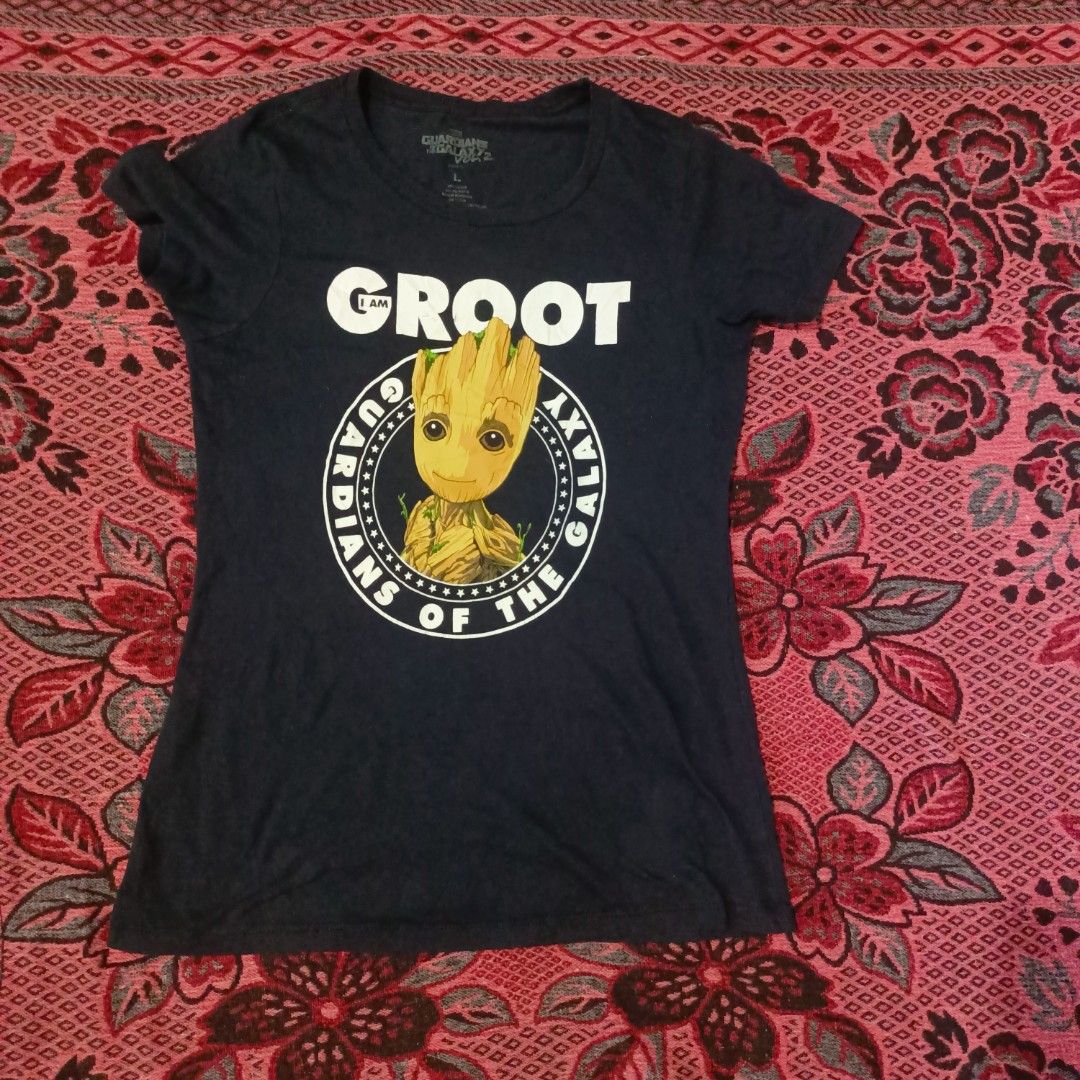 Marvel (I am Groot) (Category: Activewear) located in Cavite. Submitted by kjthriftlabcorner (Listing ID 1462907073, Image 2). Description: - Official Licensed: Marvel — Guardians of the Galaxy Vol. 2 ​ - Design: "I AM GROOT" featuring Baby Groot ​ - Size: L ​ - Color: Navy Blue ​ - Material: 60% cotton / 40% polyester.