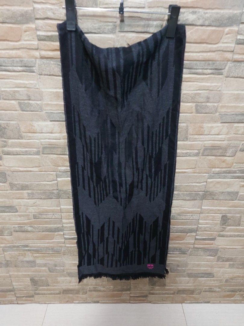 MCM wool shawl black (Category: Scarves) located in Quezon City. Submitted by threetwotwo2ndaccount (Listing ID 1462949719, Image 1). Description: MCM wool shawl black made in italy with wash tag size: L-68", W-14" bawal sa maselan bawal sa barat.