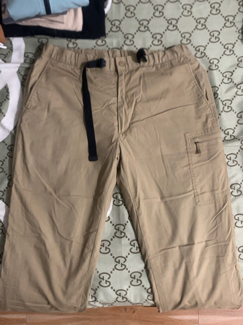 Men's Uniqlo HEATTECH Warm Lined (Category: Other Bottoms) located in Imus. Submitted by vblackfire23 (Listing ID 1463081690, Image 1). Description: - Uniqlo HEATTECH Cargo Pants - Color: Khaki - Size: L (fits waist 84-92cm) - Material: Warm HEATTECH fabric, ideal for cold weather - Features: Drawstring waist, multiple pockets including a side zippered pocket - Style: Casual wear, comfortable and functional - Origin: Made in Indonesia.